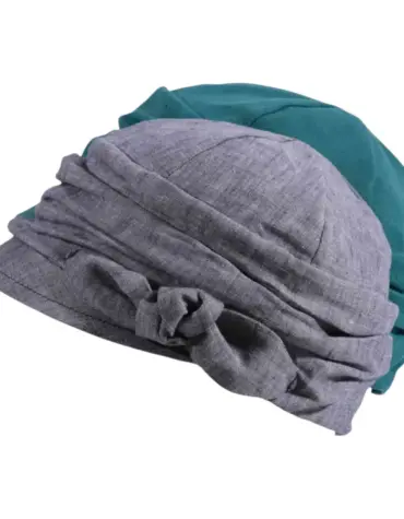 Ballonmütze aus Leinen für Damen und Mädchen in Schwarz meliert oder Petrol mit Schleifendetail