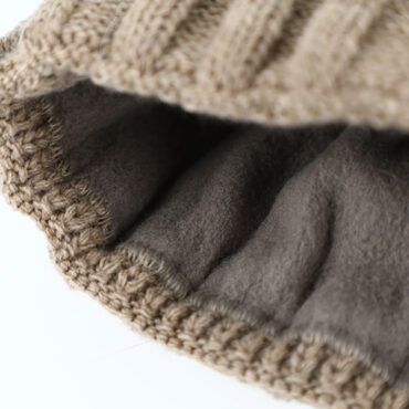 Strickmütze mit Kunstfellbommel mit Umschlag uni – hochwertige Kopfbedeckung von Fiebig bei Hut Factory Schweiz